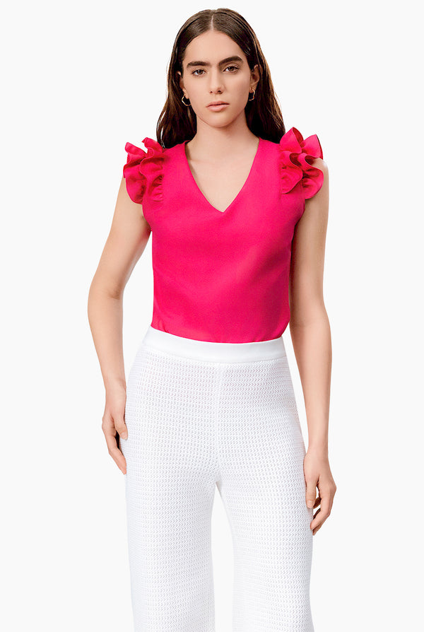 Blusa lisa con mangas de olan