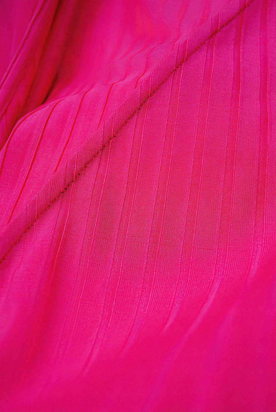 Blusa fucsia cruzada con amarre lateral y manga larga