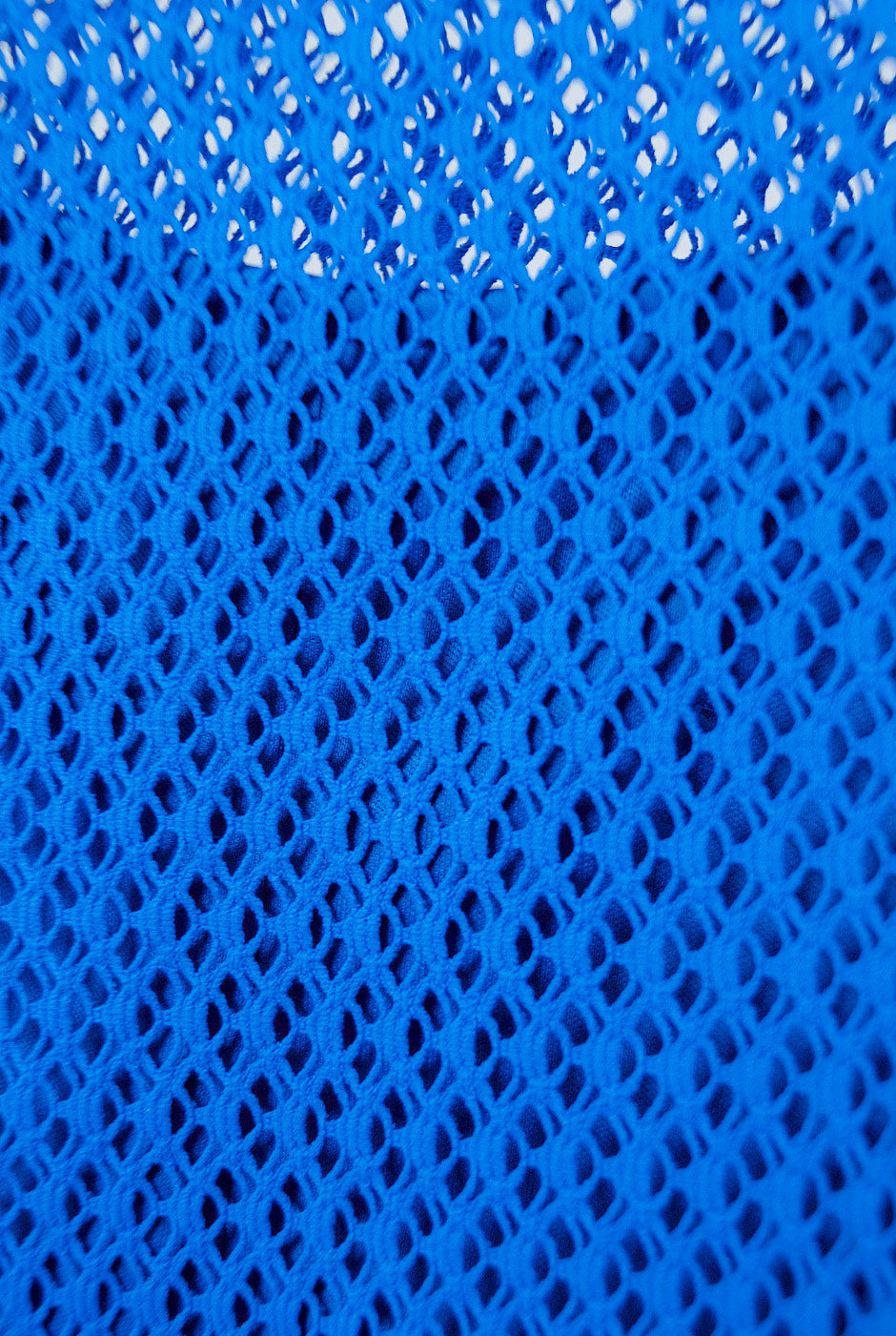 Blusa túnica azul tejida de manga larga y cuello redondo