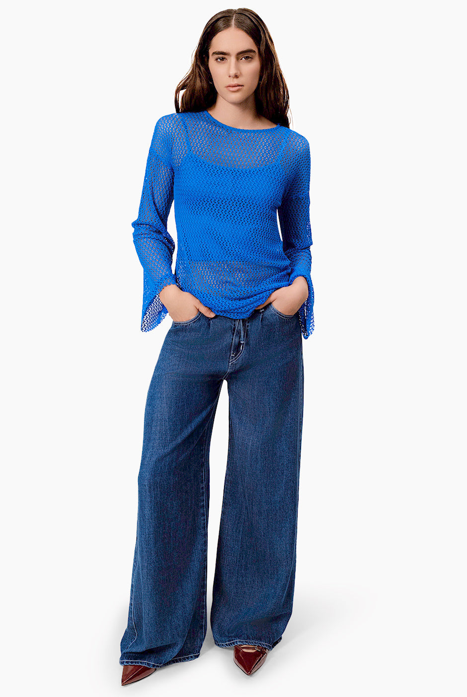 Blusa túnica azul tejida de manga larga y cuello redondo