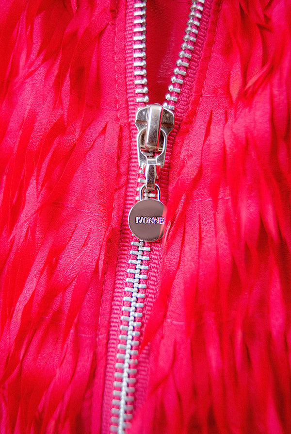 Top corto sin mangas fucsia