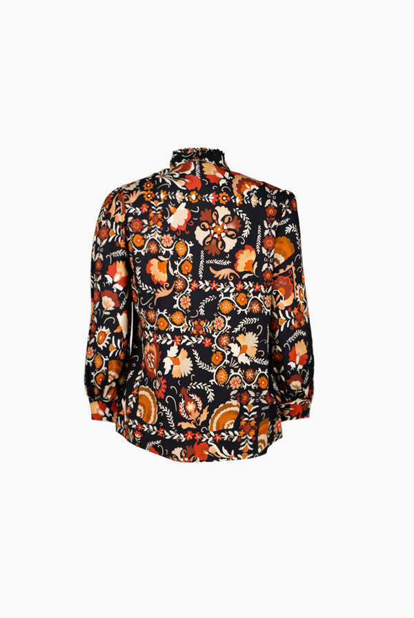 Blusa estampada y manga larga