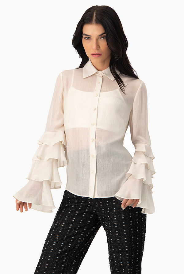 Blusa manga larga con olanes