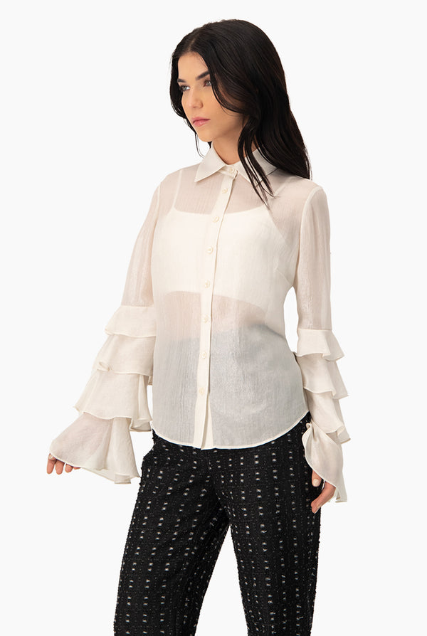 Blusa manga larga con olanes