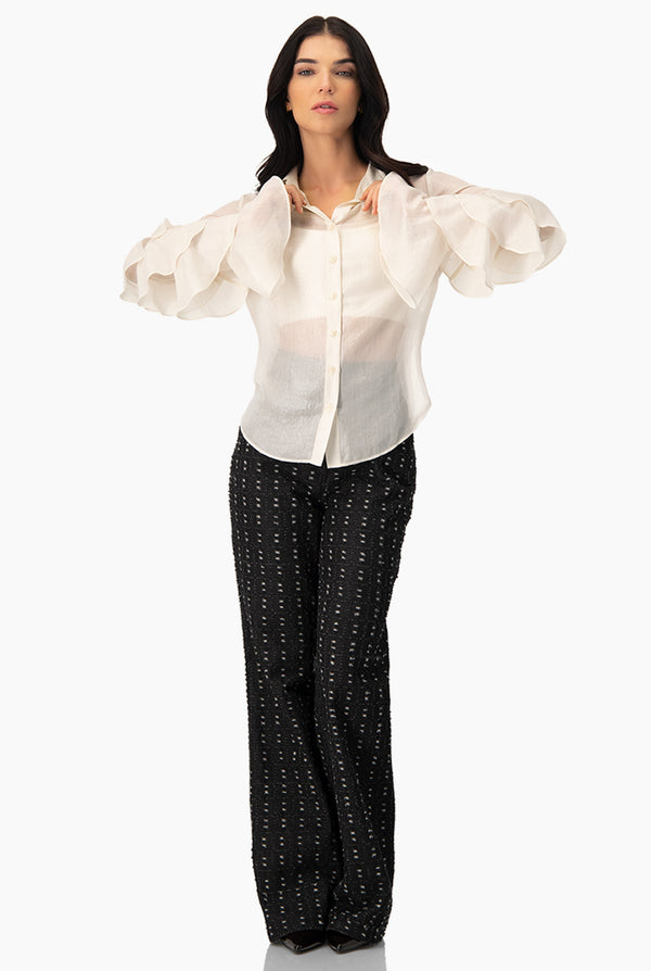 Blusa manga larga con olanes