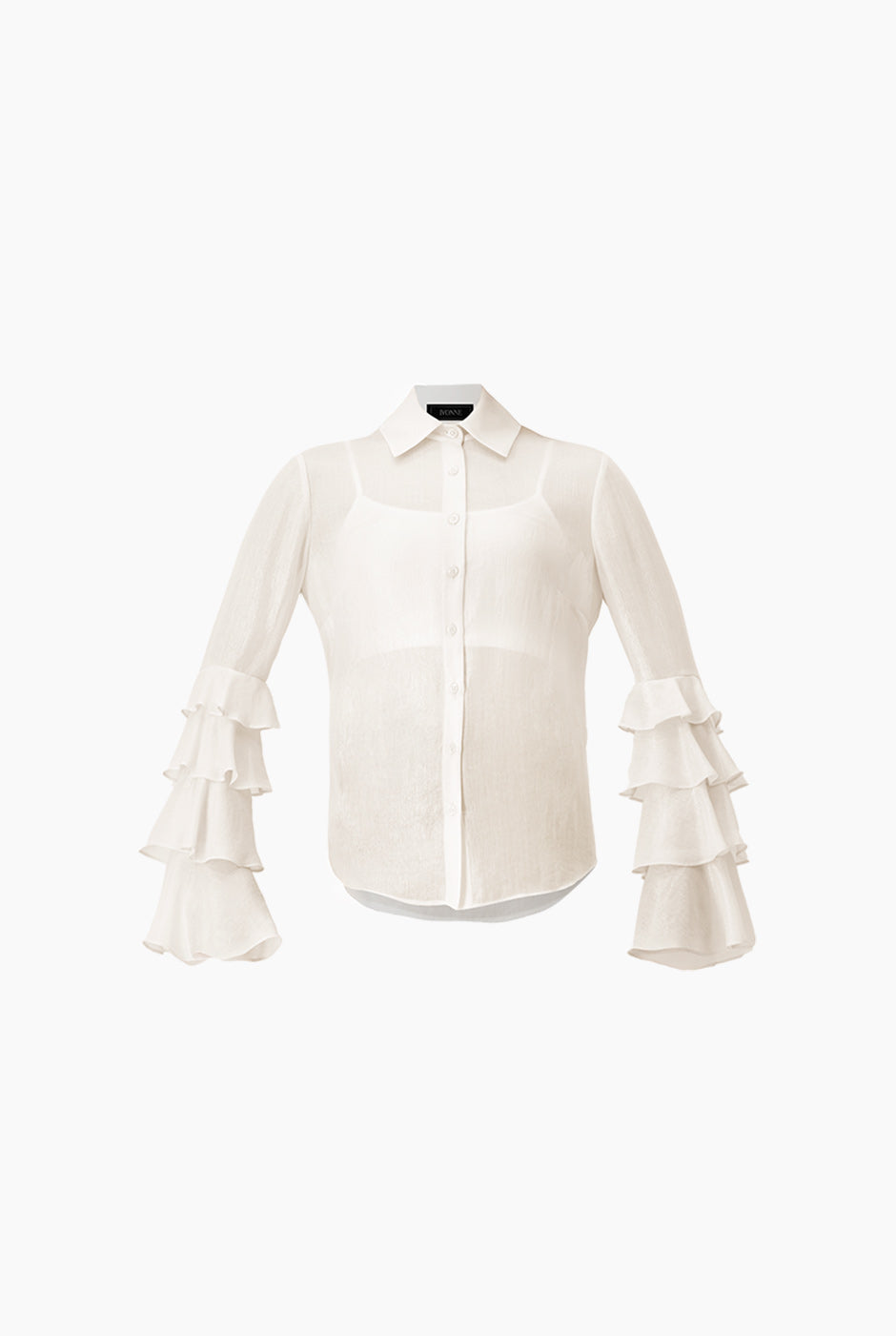 Blusa natural de manga larga con olanes y botones frontales.