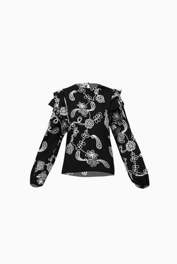 Blusa de manga larga y volantes