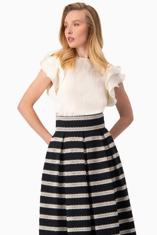 Blusa de manga volantes