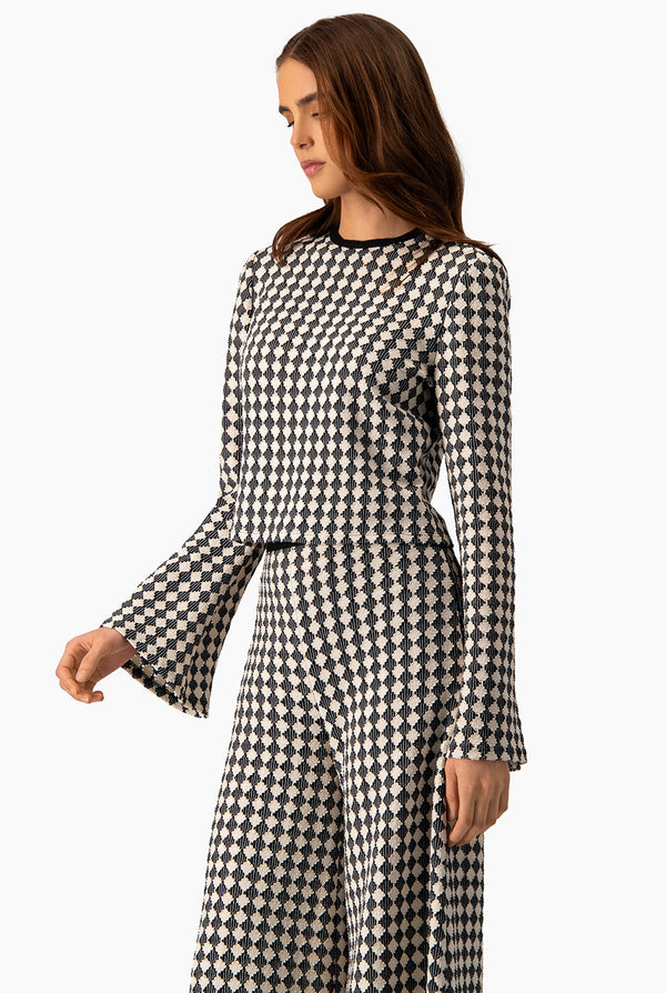 Blusa de manga larga acampanada