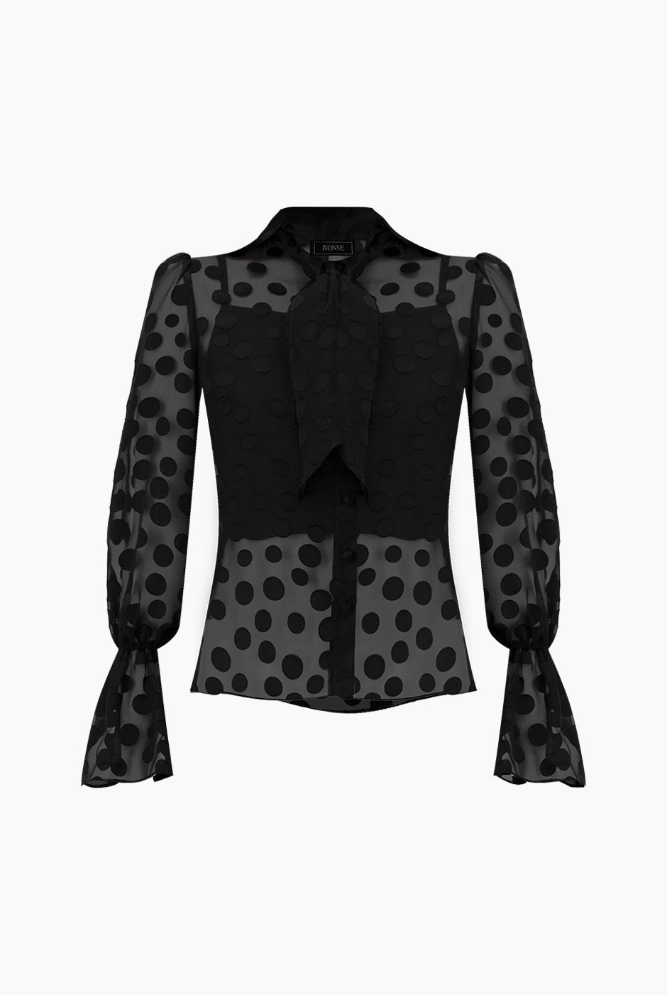 Blusa negra con lunares y lazo en el cuello