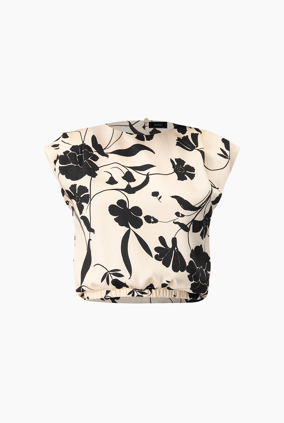Blusa estampada sin mangas con diseño floral en blanco y negro