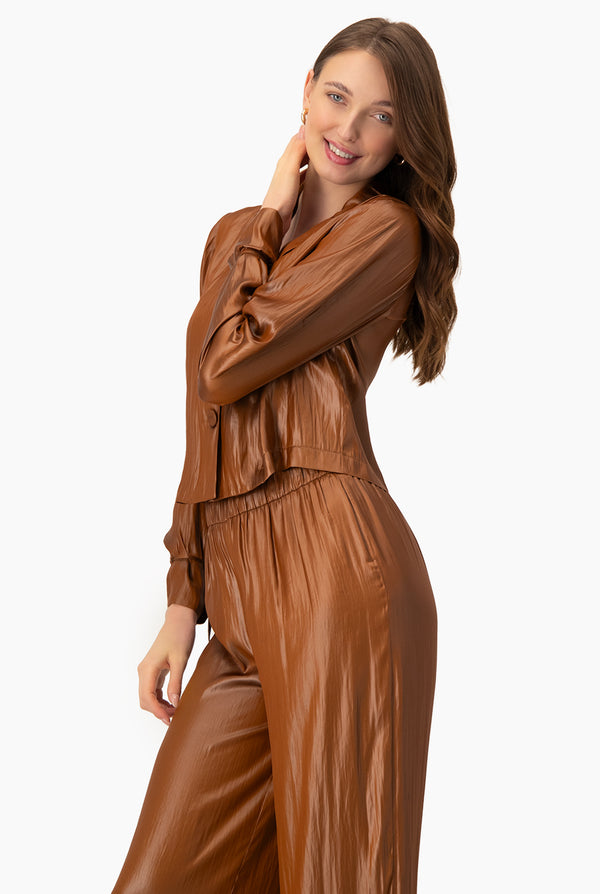 Blusa lisa con cintas en mangas