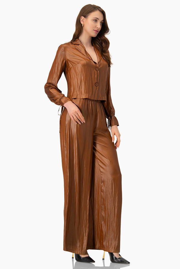 Blusa lisa con cintas en mangas