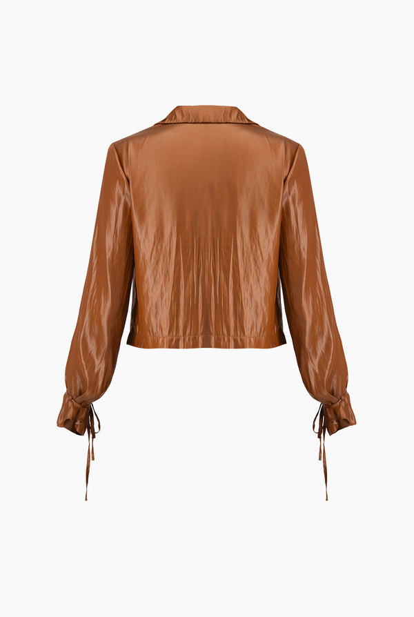 Blusa lisa con cintas en mangas