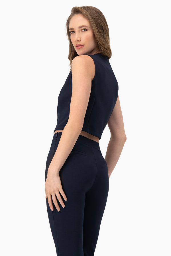 Top corto con cierre frontal