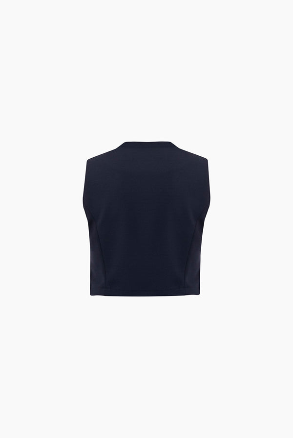 Top corto con cierre frontal