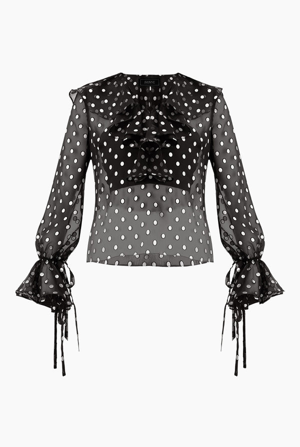 Blusa de lunares y escote en V