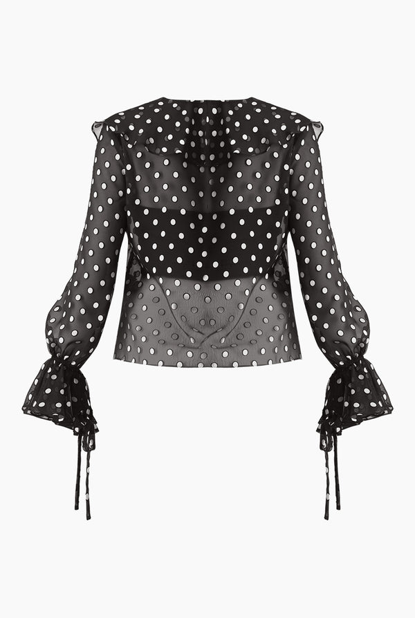 Blusa de lunares y escote en V