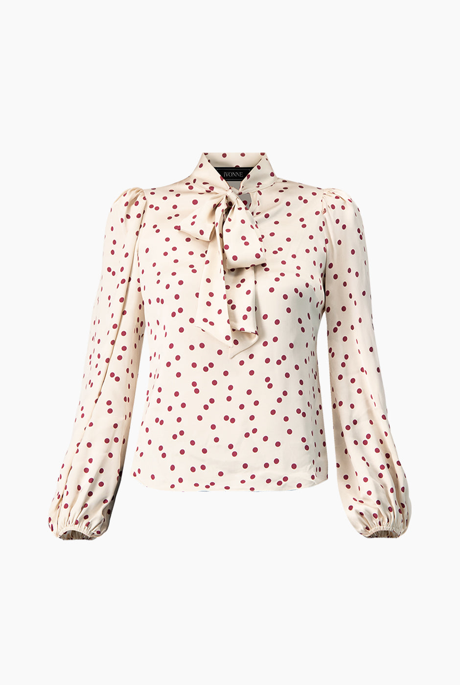 Blusa marfil con lunares y lazo en el cuello