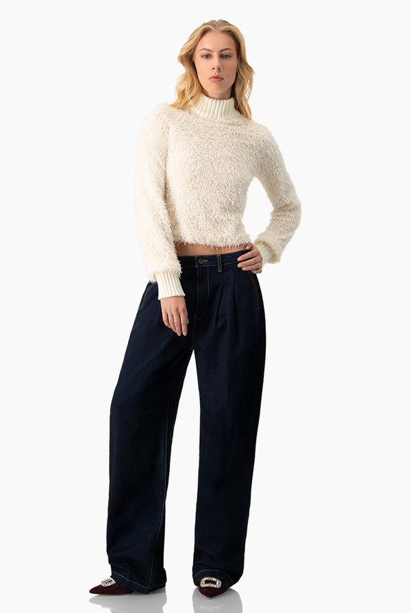 Blusa de flecos y manga larga