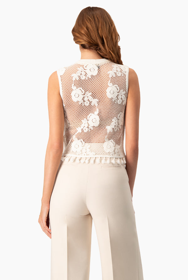 Blusa tejida con flecos