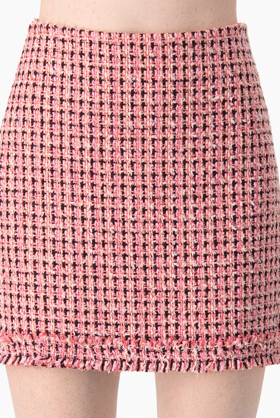 Falda tejida corta rosa con olanes y cierre trasero