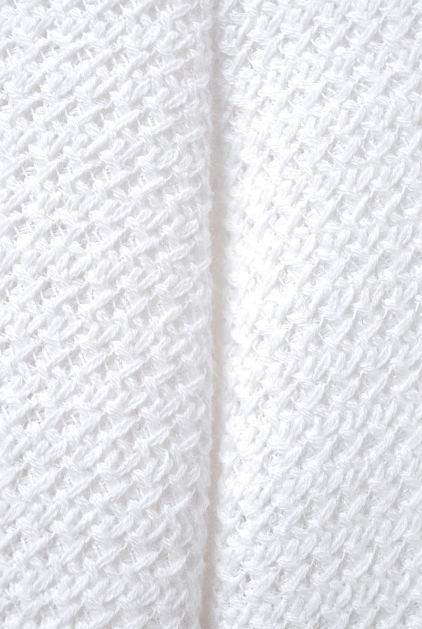 Pantalon tejido en tono blanco