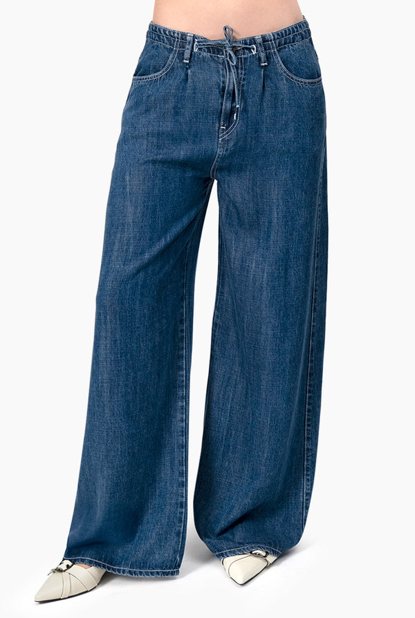 Jeans de pierna amplia y jareta