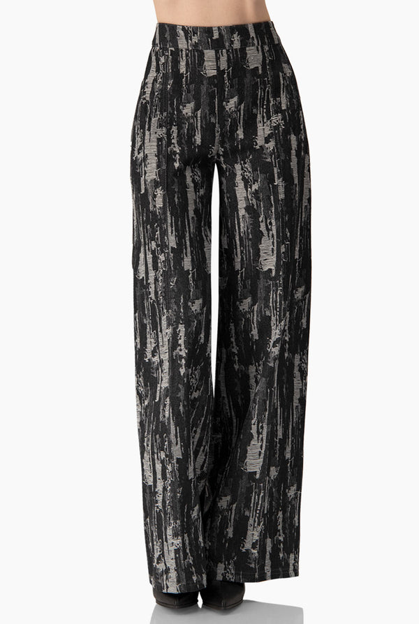 Pantalon tiro alto y pierna amplia