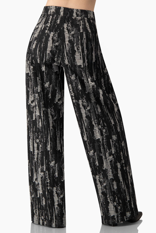 Pantalon tiro alto y pierna amplia