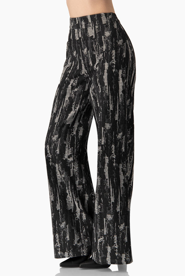 Pantalon tiro alto y pierna amplia