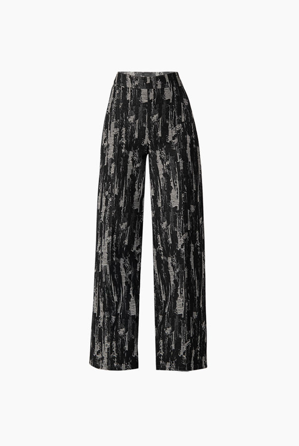 Pantalon tiro alto y pierna amplia