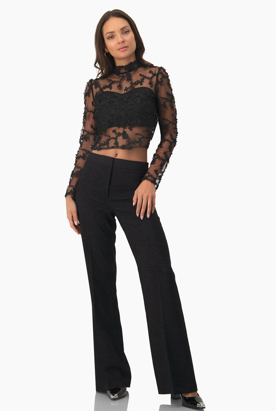 Pantalón negro recto con cierre y bolsillos simulados