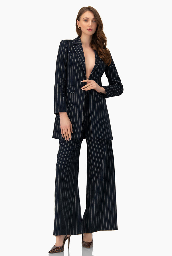 Pantalon amplio rayado con cinturon