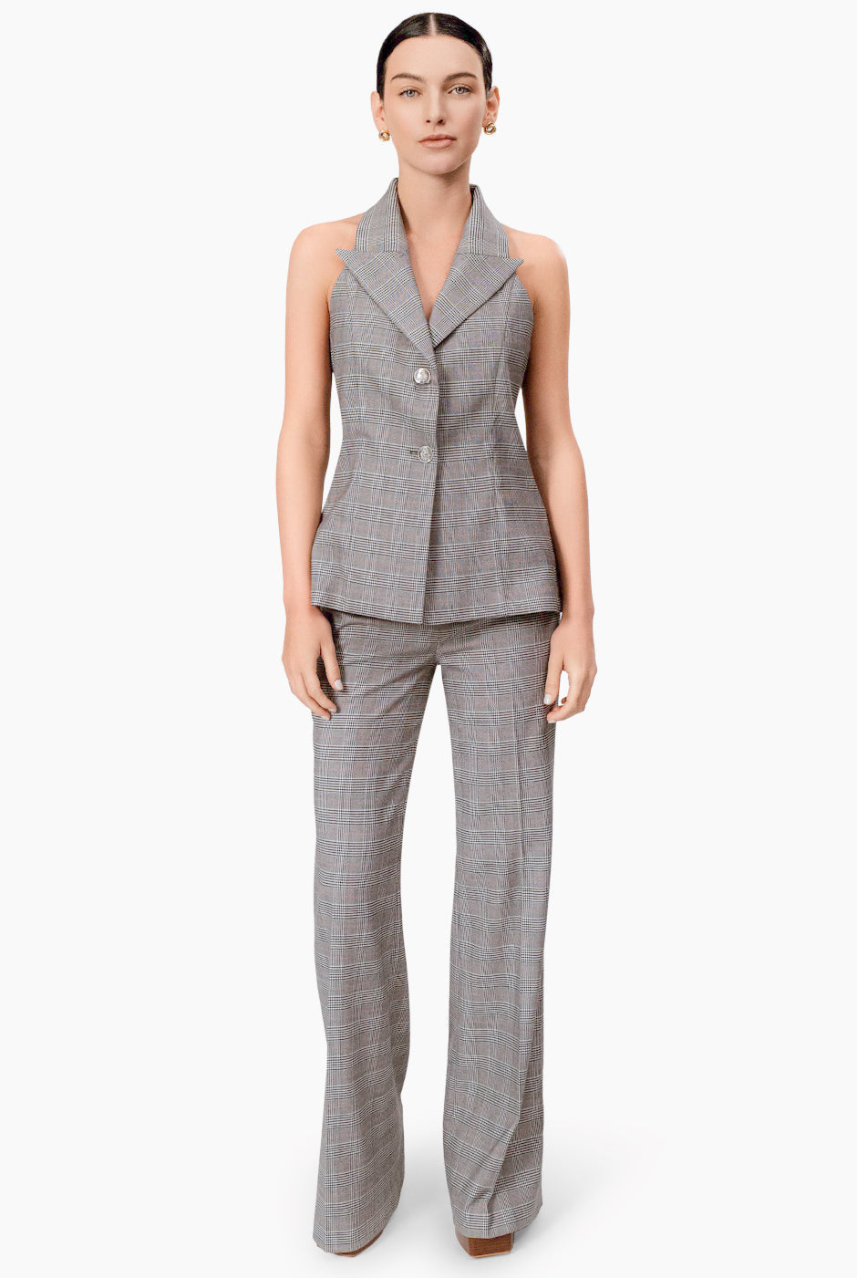 Chaleco cruzado gris con botones frontales y solapas amplias