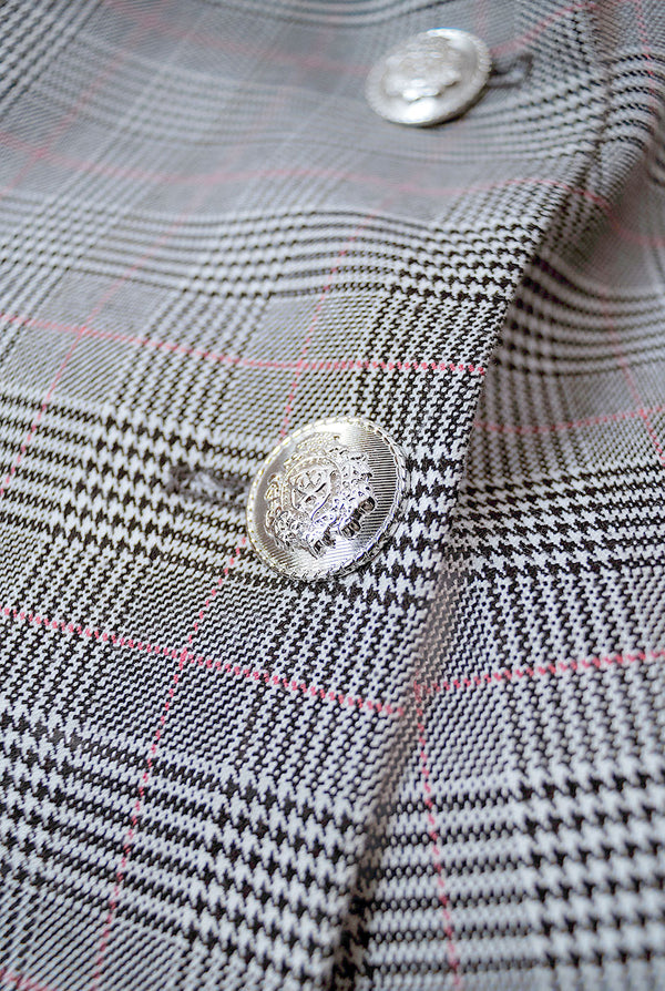 Chaleco de cruce sencillo y botones