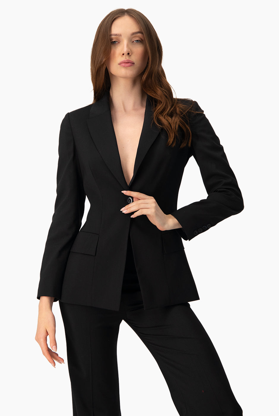 Saco negro cruzado con botones y bolsillos