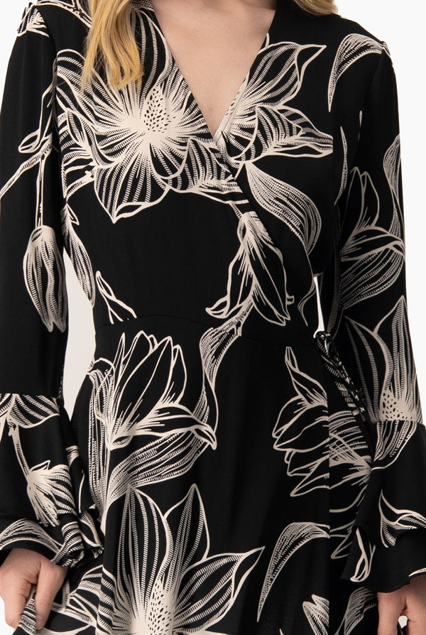 Vestido de manga larga con olanes