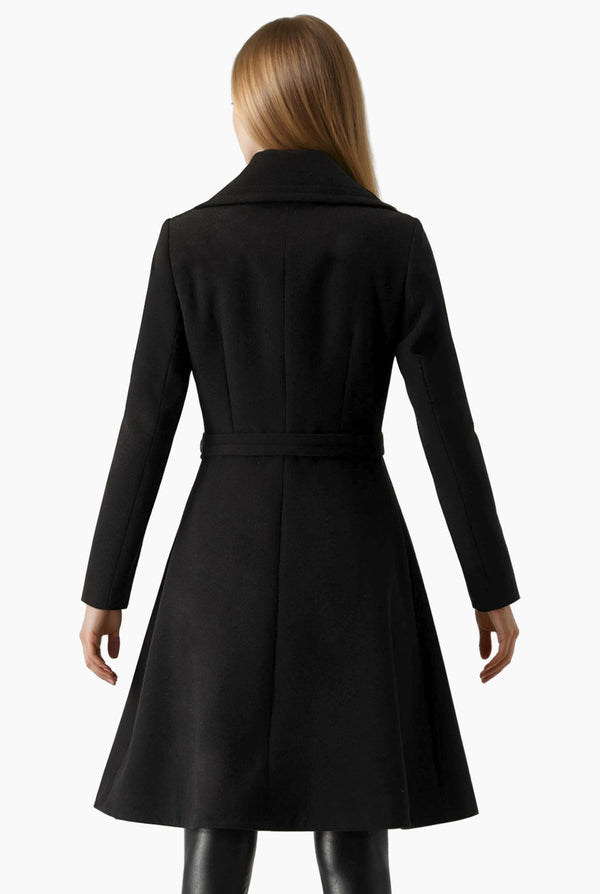 Abrigo largo con cierre y boton