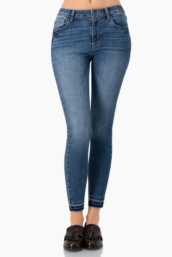 Jeans skinny de un boton frontal